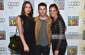 former-miss-universe-olivia-culpo-musician-nick-jonas-and-journalist-picture-id452128228.jpg