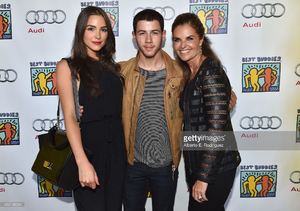 former-miss-universe-olivia-culpo-musician-nick-jonas-and-journalist-picture-id452128234.jpg