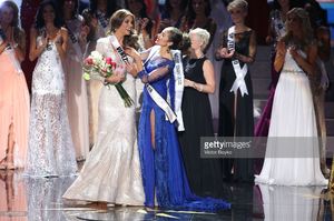 gabriela-isler-and-olivia-culpo-on-the-stage-during-the-miss-universe-picture-id187517030.jpg