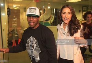 host-dj-whoo-kid-and-miss-universe-olivia-culpo-invades-the-shuffle-picture-id159067571.jpg