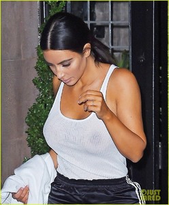 kim-kardashian-goes-braless-in-see-through-top-09.jpg