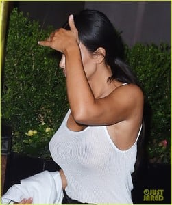 kim-kardashian-goes-braless-in-see-through-top-12.jpg