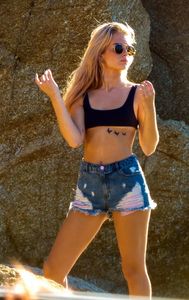 lottie-moss-in-ripped-jean-shorts-and-a-sports-bra-beach-in-mykonos-07-29-2017-1.jpg