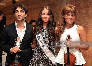 mandolin-player-avi-avital-miss-usa-olivia-culpo-and-violinist-nicola-picture-id146570799.jpg