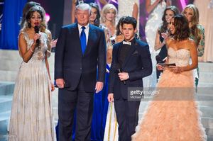 miss-universe-2012-olivia-culpo-donald-trump-musician-and-host-nick-picture-id170743799.jpg
