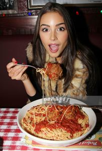 miss-universe-olivia-culpo-visits-buca-di-beppo-times-square-on-april-picture-id166556715.jpg