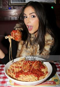 miss-universe-olivia-culpo-visits-buca-di-beppo-times-square-on-april-picture-id166556721.jpg