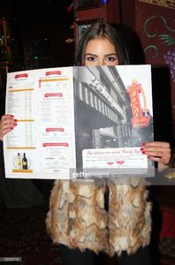 miss-universe-olivia-culpo-visits-buca-di-beppo-times-square-on-april-picture-id166556725.jpg