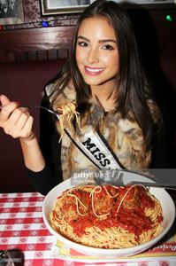 miss-universe-olivia-culpo-visits-buca-di-beppo-times-square-on-april-picture-id166556727.jpg