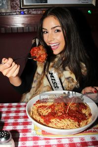 miss-universe-olivia-culpo-visits-buca-di-beppo-times-square-on-april-picture-id166556741.jpg