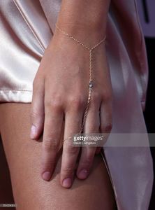 model-kara-del-toro-bracelet-detail-attends-the-premiere-of-summit-picture-id594354024.jpg