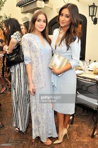 model-olivia-culpo-and-actress-shay-mitchell-attend-netaportercom-picture-id463975724.jpg