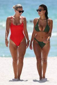 natasha-oakley-and-devin-brugman-in-bikinis-beach-in-miami-07-19-2017-12.jpg