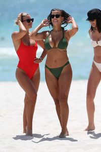 natasha-oakley-and-devin-brugman-in-bikinis-beach-in-miami-07-19-2017-15.jpg