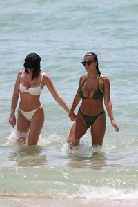 natasha-oakley-and-devin-brugman-in-bikinis-beach-in-miami-07-19-2017-16.jpg
