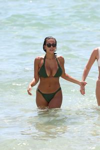 natasha-oakley-and-devin-brugman-in-bikinis-beach-in-miami-07-19-2017-3.jpg