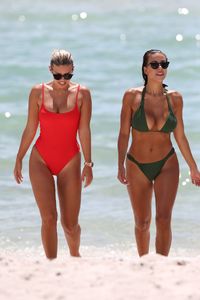 natasha-oakley-and-devin-brugman-in-bikinis-beach-in-miami-07-19-2017-7.jpg