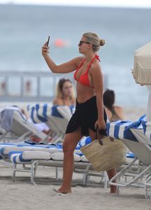 natasha-oakley-in-red-bikini-joins-davin-brugman-at-miami-beach-07-18-2017-2.jpg