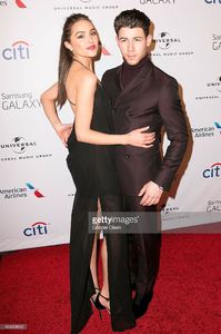 nick-jonas-and-olivia-culpo-arrive-for-the-universal-music-group-2015-picture-id463068662.jpg