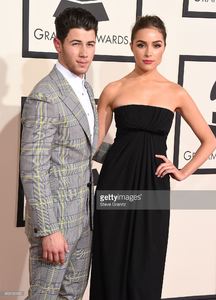 nick-jonas-and-olivia-culpo-arrives-at-the-the-57th-annual-grammy-on-picture-id463132450.jpg