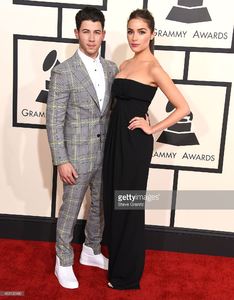 nick-jonas-and-olivia-culpo-arrives-at-the-the-57th-annual-grammy-on-picture-id463132480.jpg