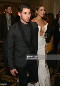 nick-jonas-and-olivia-culpo-attend-the-63rd-annual-miss-universe-red-picture-id462204386.jpg
