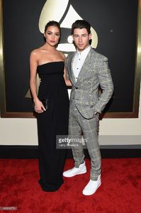 olivia-culpo-and-actorrecording-artist-nick-jonas-attend-the-57th-picture-id463010774.jpg