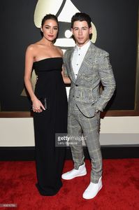 olivia-culpo-and-actorrecording-artist-nick-jonas-attend-the-57th-picture-id463010786.jpg