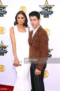 olivia-culpo-and-nick-jonas-attend-the-50th-academy-of-country-music-picture-id470435090.jpg