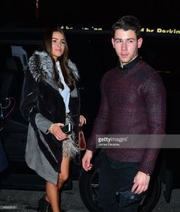 olivia-culpo-and-nick-jonas-leave-taylor-swifts-25th-birthday-party-picture-id460404018.jpg