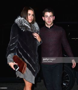 olivia-culpo-and-nick-jonas-leave-taylor-swifts-25th-birthday-party-picture-id460404076.jpg