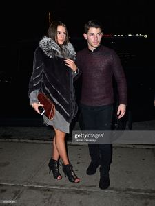 olivia-culpo-and-nick-jonas-leave-taylor-swifts-25th-birthday-party-picture-id460404080.jpg