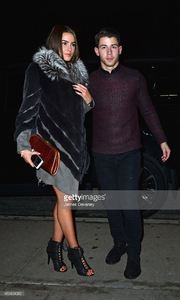 olivia-culpo-and-nick-jonas-leave-taylor-swifts-25th-birthday-party-picture-id460404082.jpg