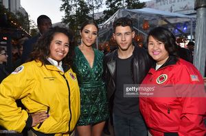 olivia-culpo-and-singer-nick-jonas-pose-with-city-year-americorps-at-picture-id471170046.jpg