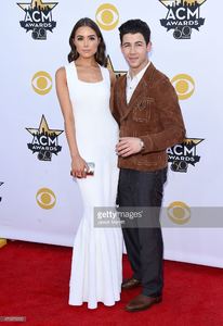olivia-culpo-and-singeractor-nick-jonas-attend-the-50th-academy-of-picture-id470379292.jpg