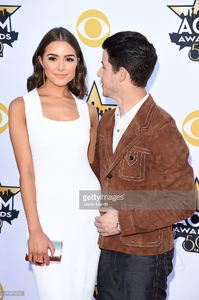 olivia-culpo-and-singeractor-nick-jonas-attend-the-50th-academy-of-picture-id470379316.jpg