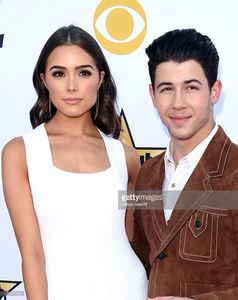 olivia-culpo-and-singeractor-nick-jonas-attend-the-50th-academy-of-picture-id470379646.jpg