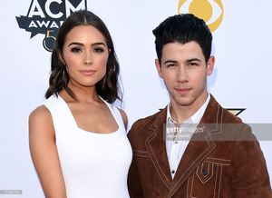 olivia-culpo-and-singeractor-nick-jonas-attend-the-50th-academy-of-picture-id470380140.jpg