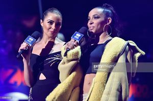 olivia-culpo-and-tinashe-perform-onstage-during-z100s-jingle-ball-at-picture-id628844600.jpg