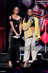 olivia-culpo-and-tinashe-speak-onstage-during-z100s-jingle-ball-2016-picture-id628894734.jpg
