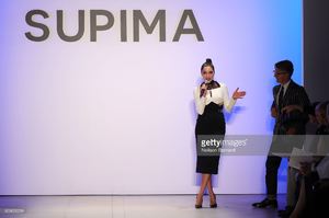 olivia-culpo-and-vp-marketing-and-promotions-at-supima-buxton-s-picture-id600629238.jpg