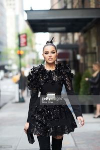 olivia-culpo-is-wearing-a-emanuel-ungaro-dress-bavna-jewelry-and-picture-id527393210.jpg