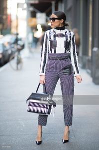 olivia-culpo-is-wearing-a-jacket-pants-and-a-bag-from-tods-seen-in-picture-id510113600.jpg
