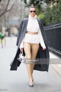 olivia-culpo-is-wearing-maiyet-coat-wolford-leather-pants-balenciaga-picture-id514027430.jpg