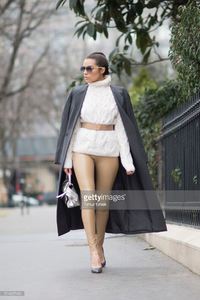 olivia-culpo-is-wearing-maiyet-coat-wolford-leather-pants-balenciaga-picture-id514027434.jpg