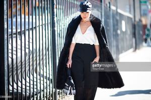 olivia-culpo-is-wearing-public-school-top-and-pants-eugenia-kim-hat-picture-id510290668.jpg