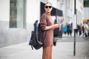 olivia-culpo-is-wearing-tibi-sweater-and-pants-marchesa-heels-celine-picture-id519456430.jpg