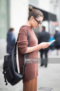 olivia-culpo-is-wearing-tibi-sweater-and-pants-marchesa-heels-celine-picture-id519456492.jpg