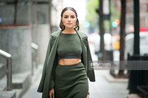 olivia-culpo-is-wearing-top-and-skirt-from-topshop-jacket-from-shoes-picture-id528322764.jpg