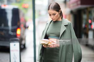 olivia-culpo-is-wearing-top-and-skirt-from-topshop-jacket-from-shoes-picture-id528322766.jpg